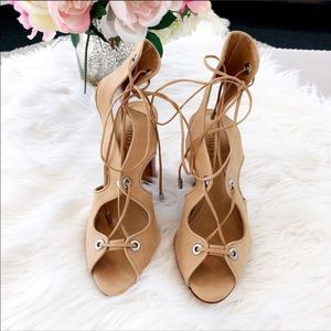 Gorgeous tan sandal heels.